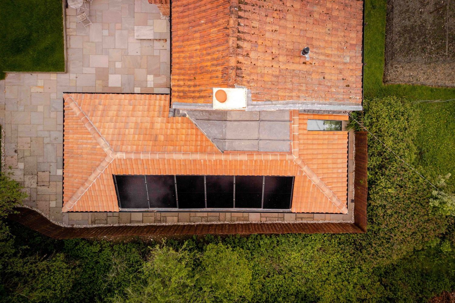 Cambrills roofscape from above, amid green countryside