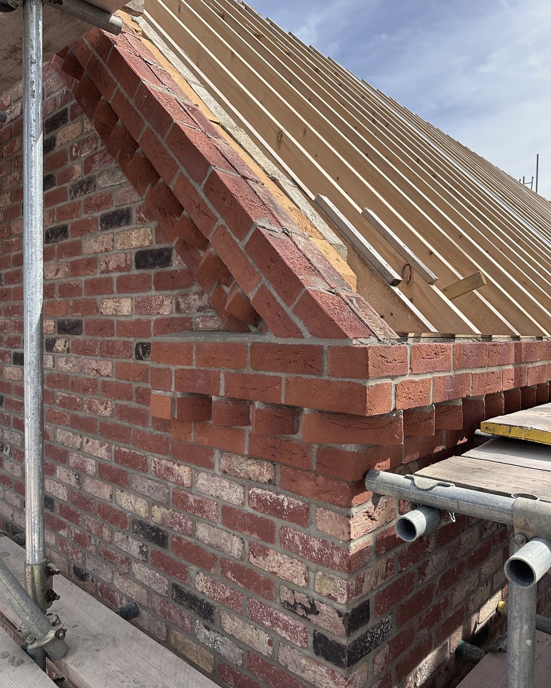 Close-up of the brick verge detail at the roof edge