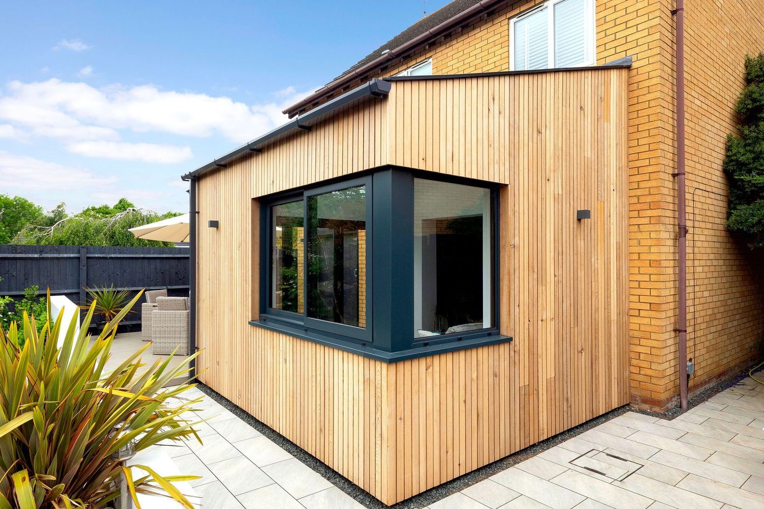 Cedar-clad rear extension at Fitzwilliam Leys