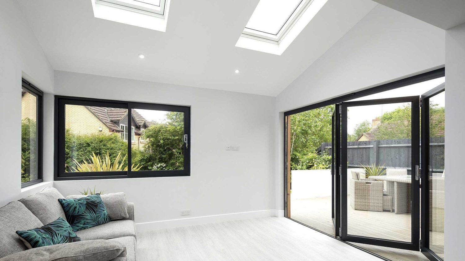 Bright open-plan living space with sliding doors