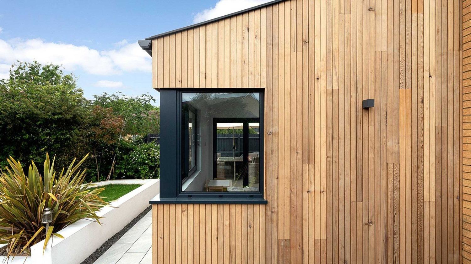 Window detail against cedar cladding