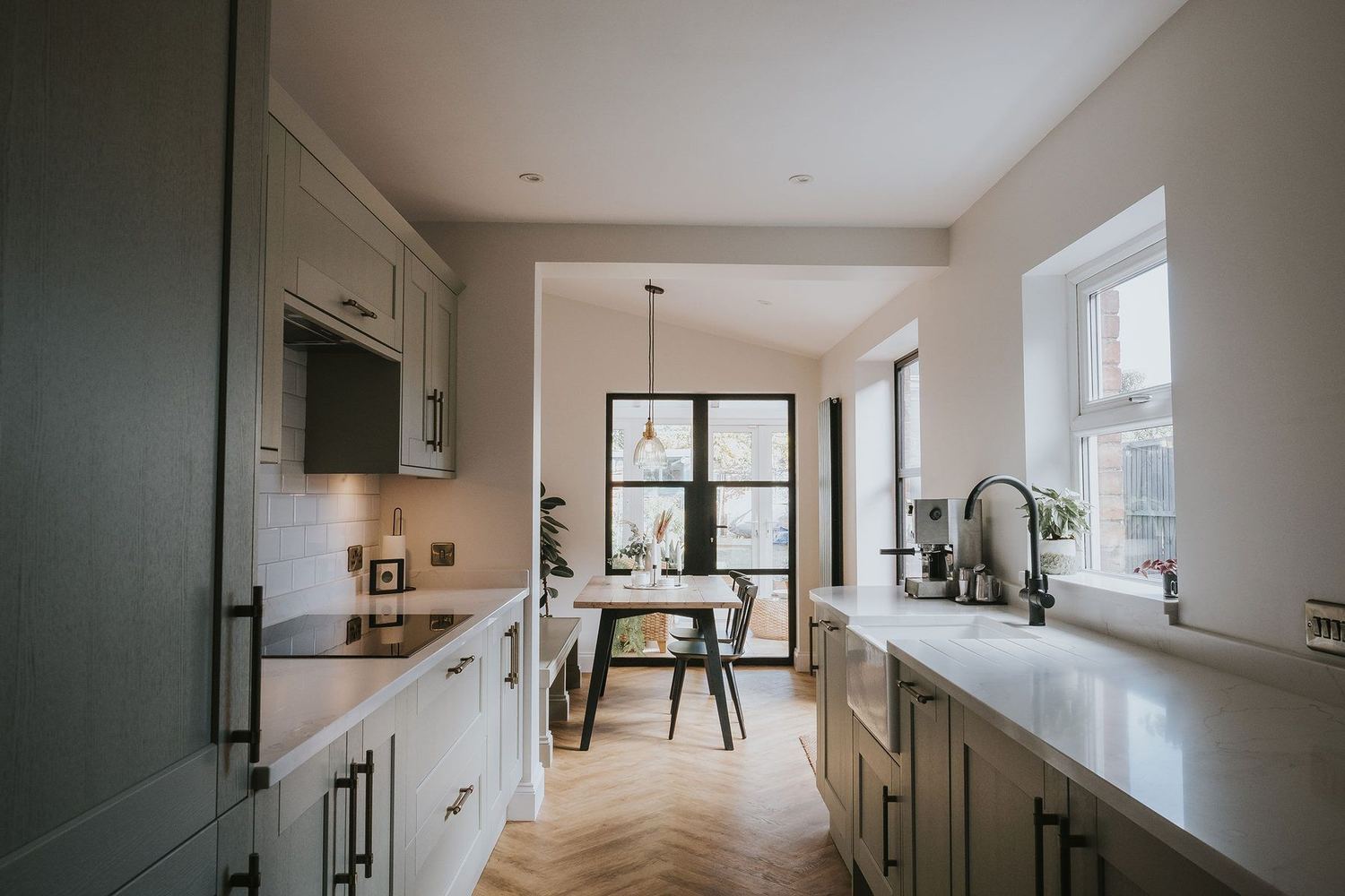 Sage-green kitchen at Kimbolton Road