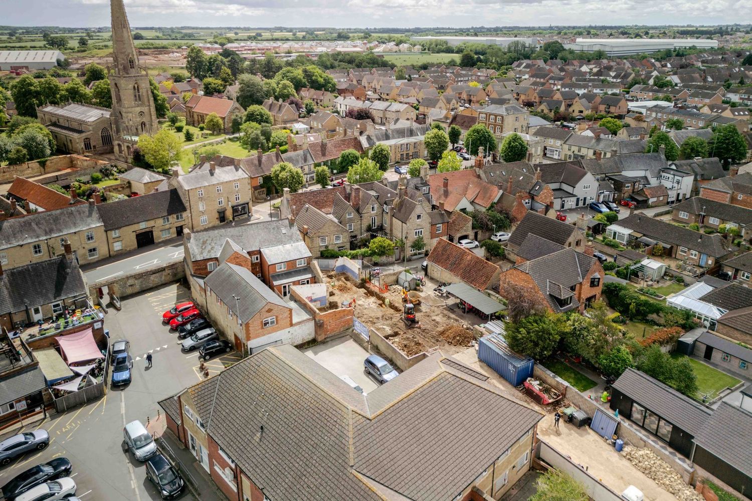 Aerial context view, June 2026
