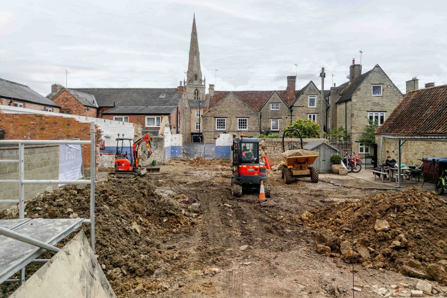 The cleared site within the town, June 2026