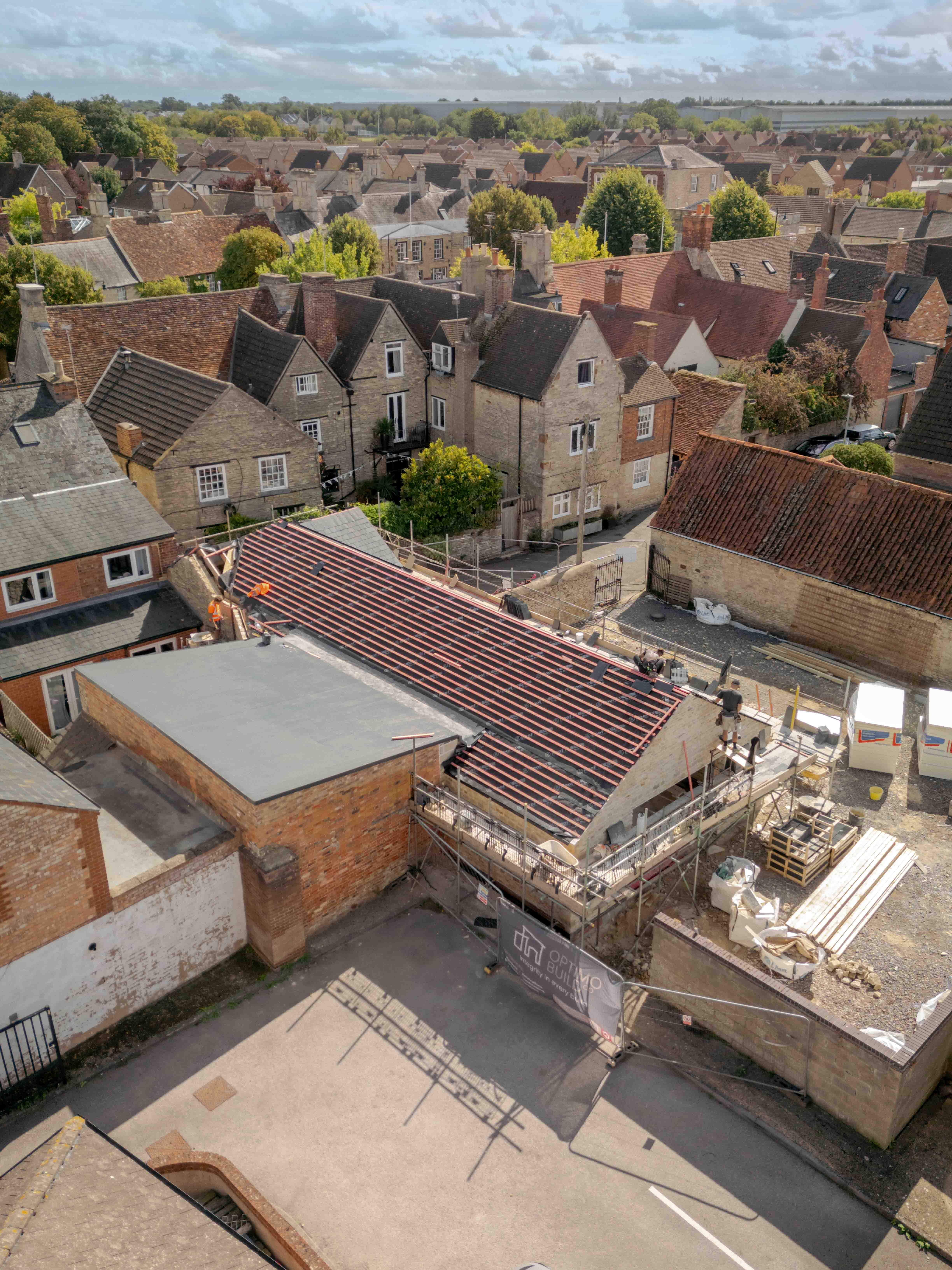 New roof going on, seen from the air, September 2026