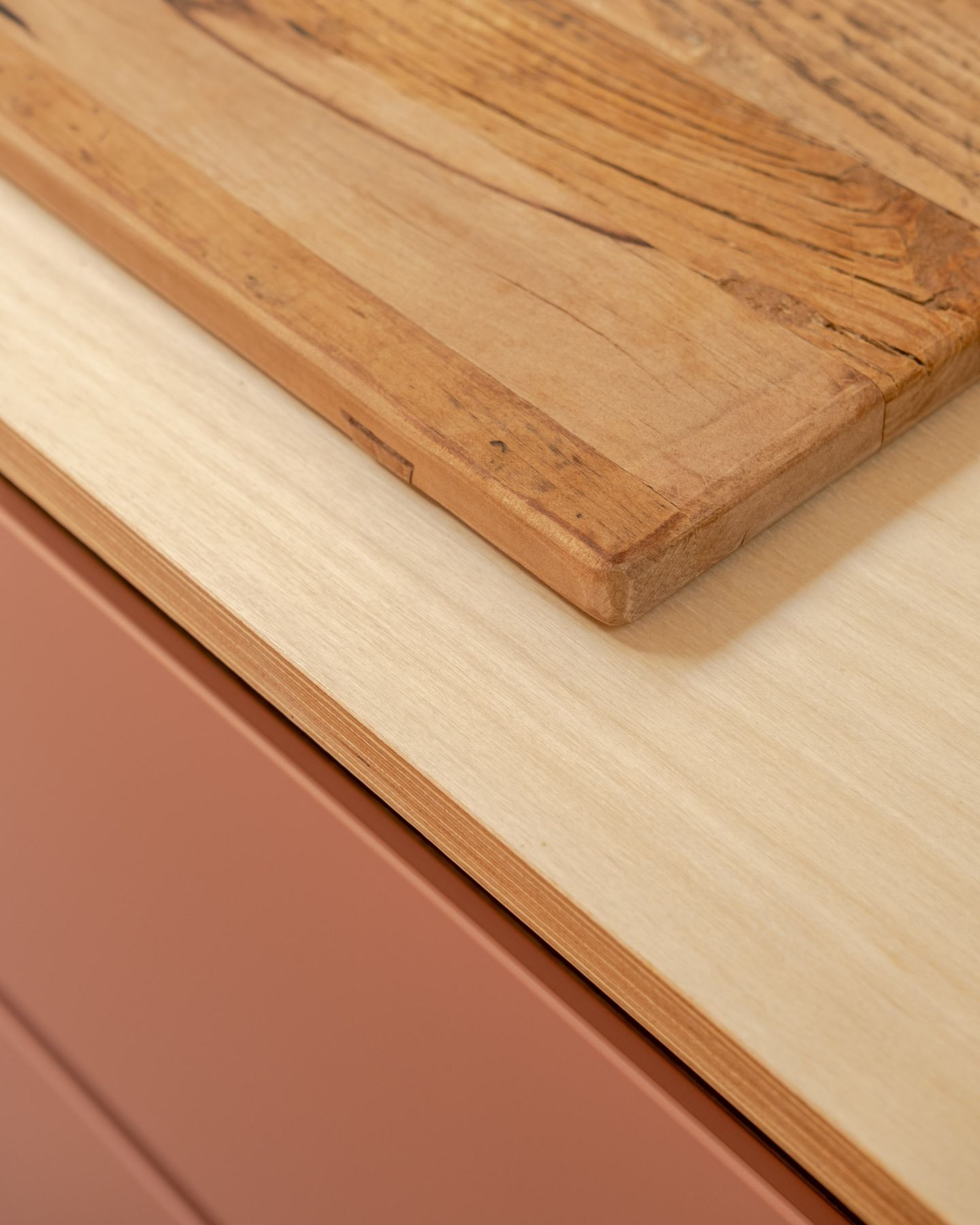 North End — cast-iron range in the hand-painted pink kitchen