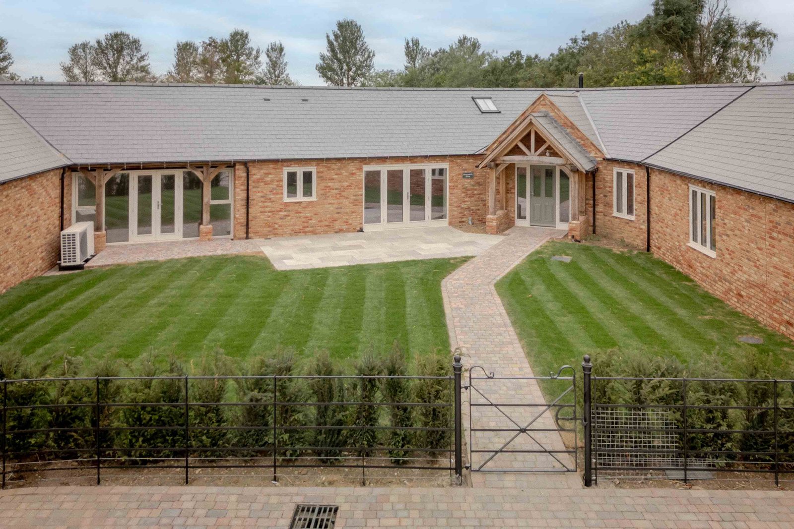 Honeysuckle House from the air, set around a lawned garden