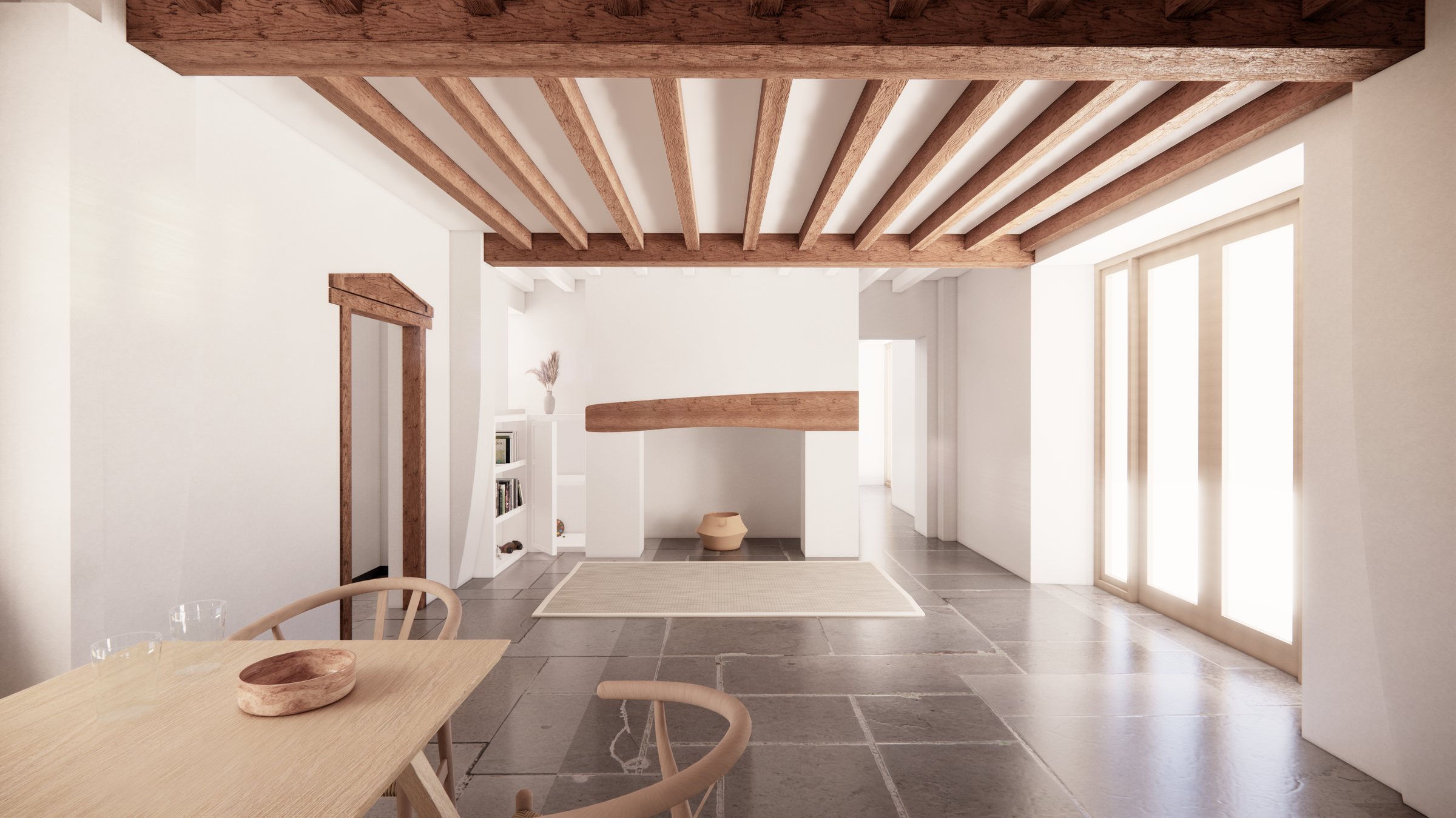The main house at Sharrington: a light living room with exposed beams, a simple fireplace and stone floors running out to the garden