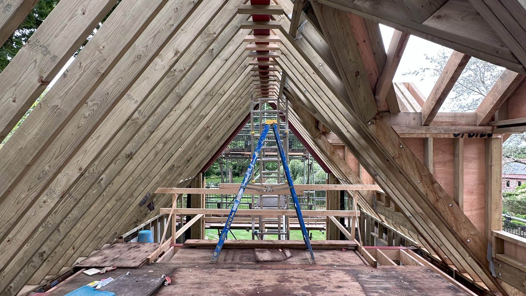 Inside the new roof structure, looking towards the gable