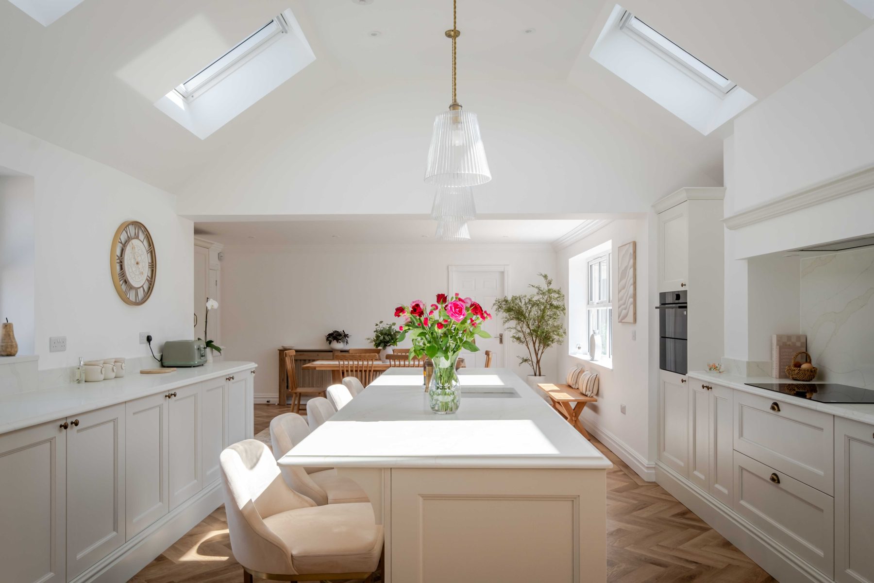 Oak dining table on herringbone floor