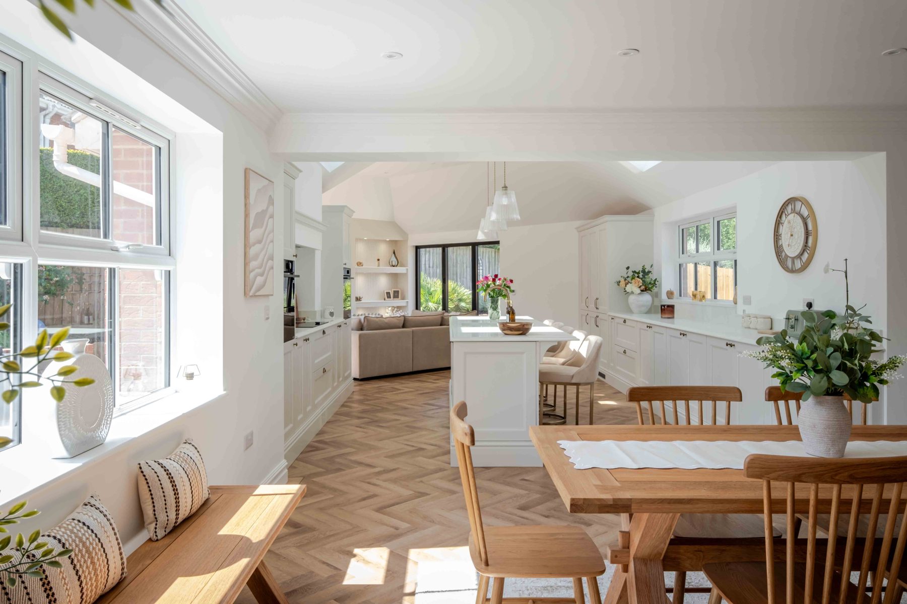 Bright open-plan kitchen and dining space with vaulted rooflit ceiling