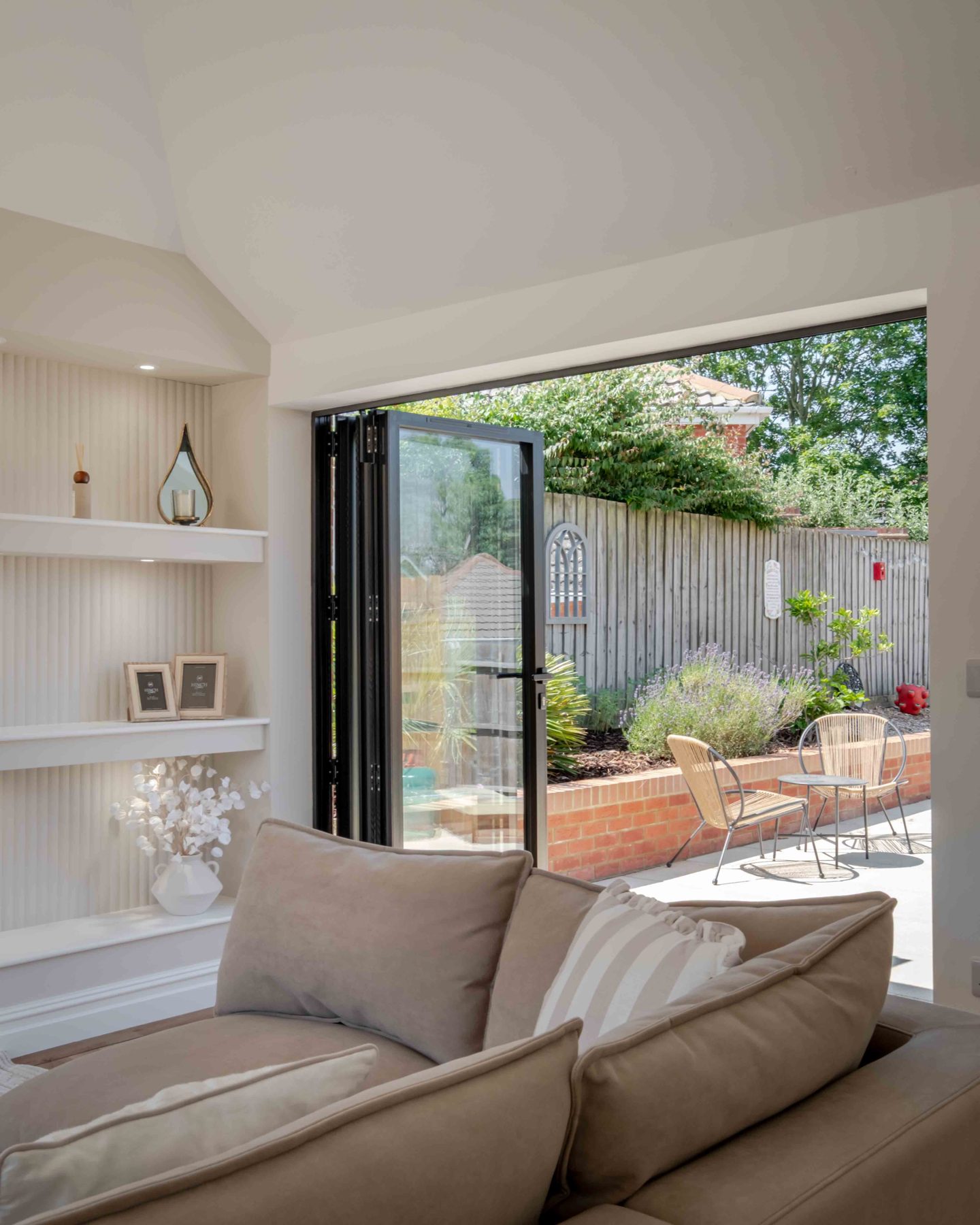 Bi-fold doors opening to the garden terrace
